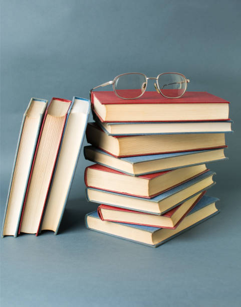 istock Bunch of books and reading glasses 659345334