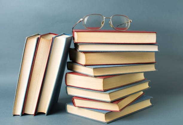 istock Bunch of books and reading glasses 659346466