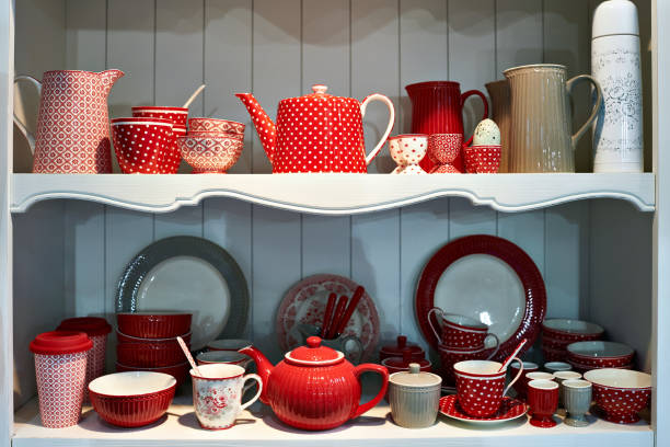 Red antique porcelain utensils in sideboard