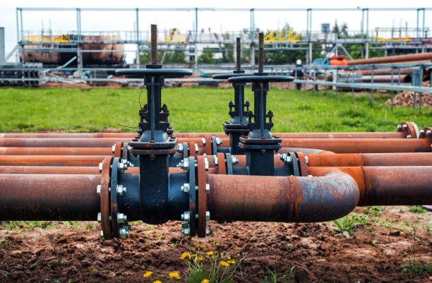 istock steel pipes with valves 659385170