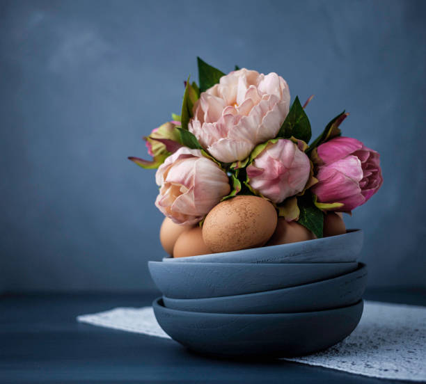 istock Easter still life arrangement with natural eggs and peony bouquet 659404976
