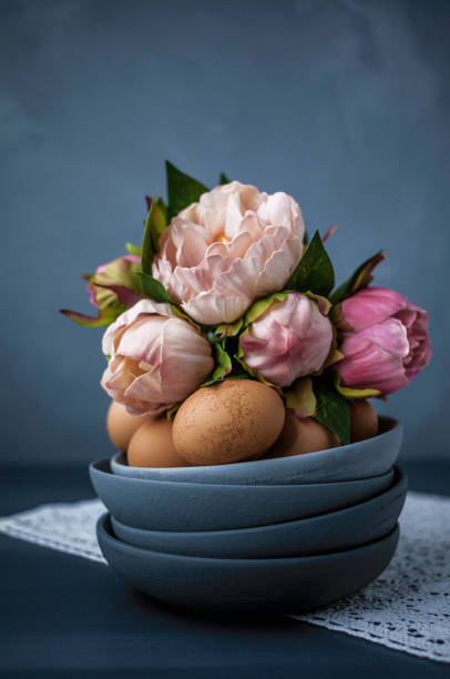 istock Easter still life arrangement with natural eggs and peony bouquet 659405014