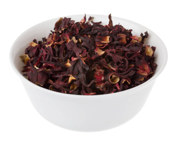 istock dry hibiscus tea in bowl on white background 659444234