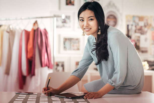Fashion designer in her studio