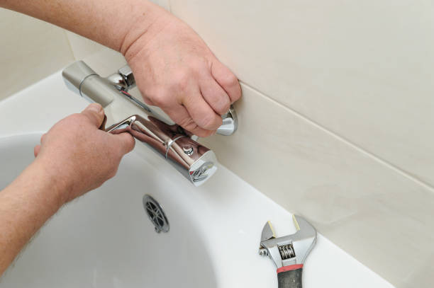 istock Installing faucet with thermostat. 659517040