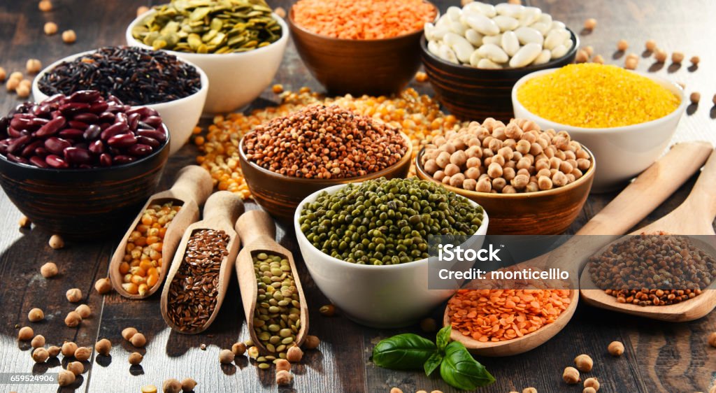 Composition with variety of vegetarian food ingredients Composition with variety of vegetarian food ingredients. Cereal Plant Stock Photo