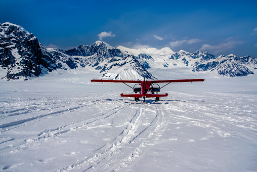 Snow Plane Landing on Ruth Glacier in Denali National Park, Alaska.  The Great Alaskan Wilderness.  A Beautiful Snowscape of Rock, Snow, and Ice.