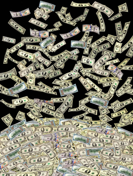 istock dollars flying on the heap in the darkness 659533048