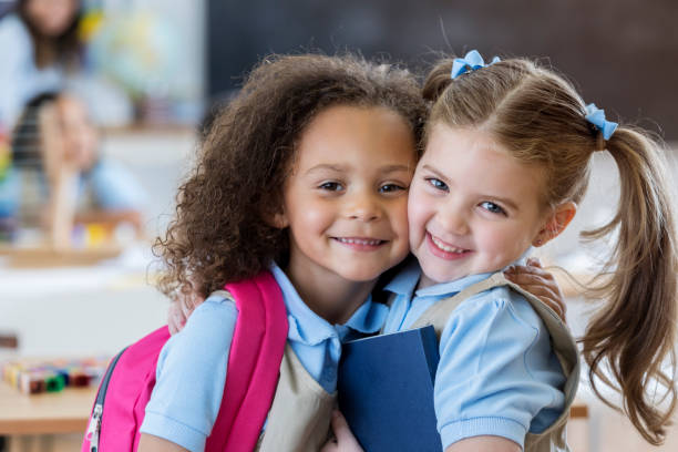 istock Happy kindergarten schoolgirls 659542306