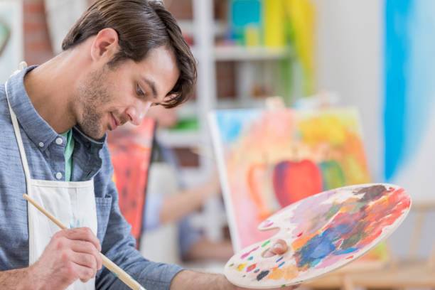 istock Male Caucasian artist in his studio 659542636