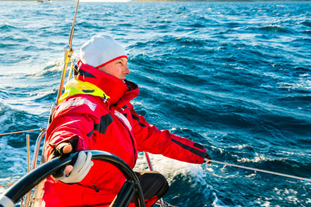 istock Skipper sailing on sailboat during regatta 659549282
