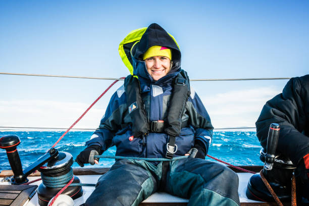 istock Happy woman sailing during regatta 659549526