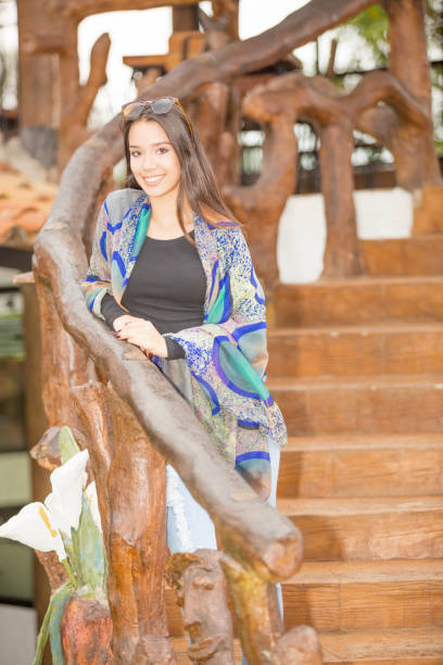 istock Young Lady Posing in the Stairs 659571868