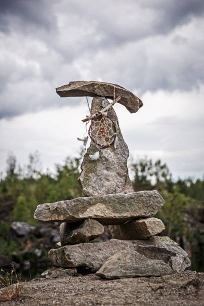 istock Dreamcatcher on a pyramid of stones 659599104