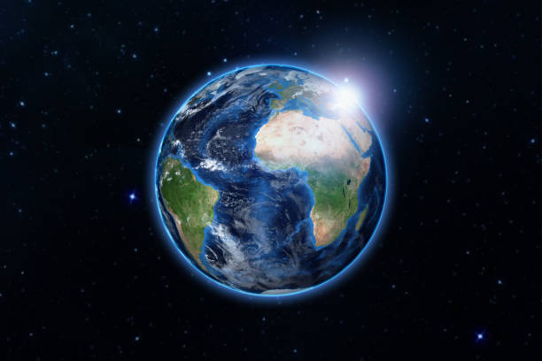 istock blue planet earth from space showing America and Africa, USA, globe world with blue glow edge and sun light sunrise on space in a star field, some elements of this image furnished by NASA 659602808