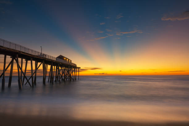 istock Sun rays at Belmar Fishing Pier 659609144