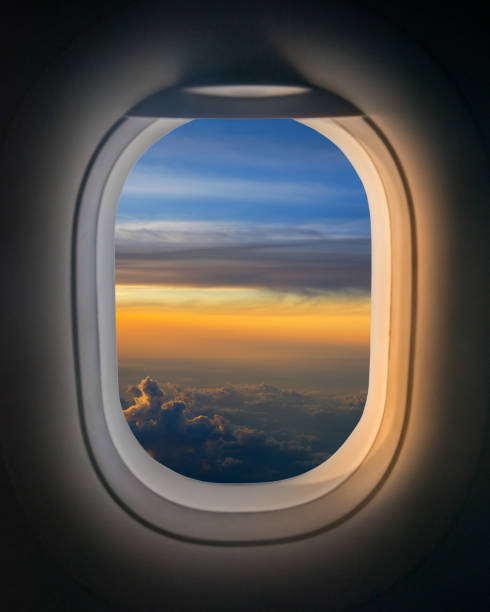istock View of an Airplane Window during a sunset 659635398