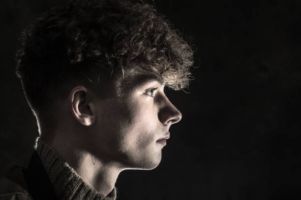Curly Hair Teenage Boy Stock Photos, Pictures & Royalty-Free Images - iStock