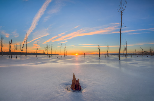 Sunrise at Manasquan Reservoir after a snow storm.