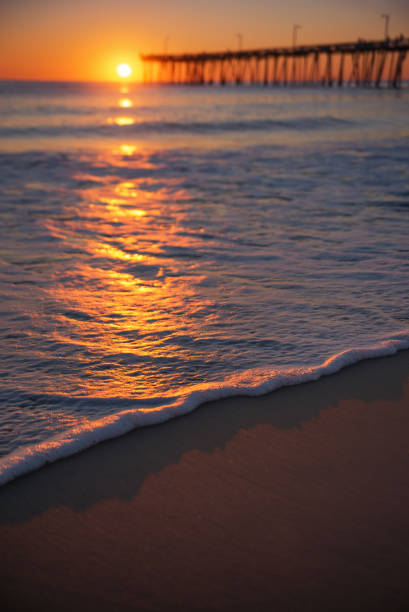 istock Sun shining across the water 659654102