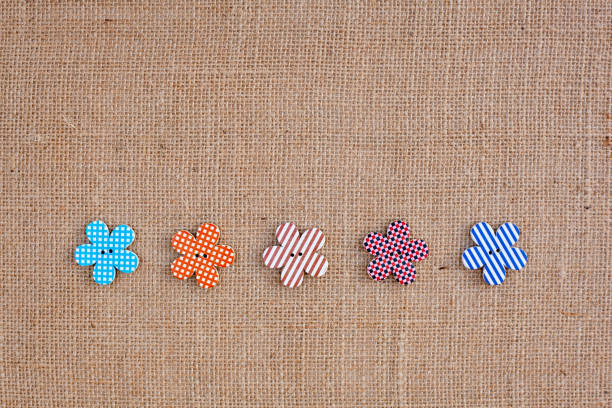 Background - burlap hessian with flower button decoration