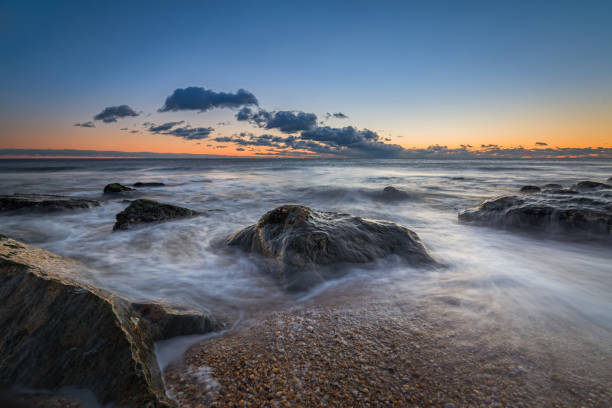 istock Rocky seascape sunrise in New Jersey 659659526