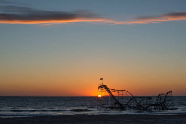 istock Sunrise behind the iconic Jet Star roller coaster after hurricane Sandy 659660544