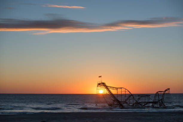 istock Sunrise behind the iconic Jet Star roller coaster after hurricane Sandy 659660564