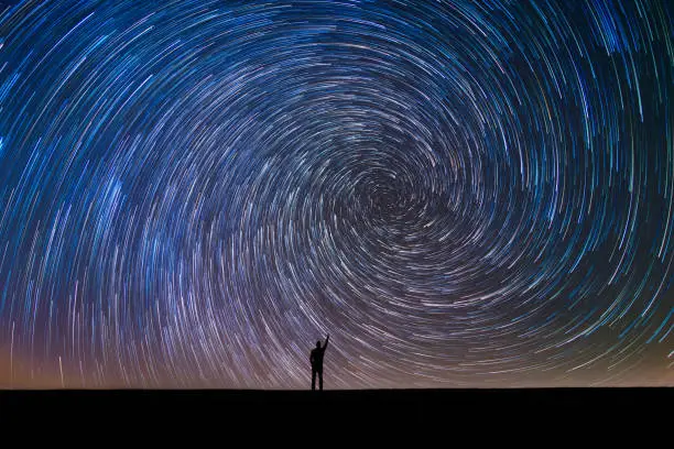 Photo of Pointing at the North Star in a star trail