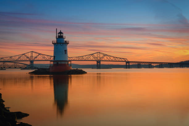 istock Reflections of Sleepy Hollow Lighthouse at sunset 659662006