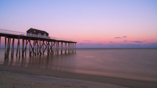 istock Belmar Fishing Pier at sunset 659664190