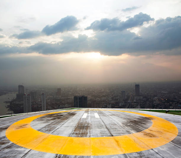 istock Helipad on Bangkok sunset background 659696302