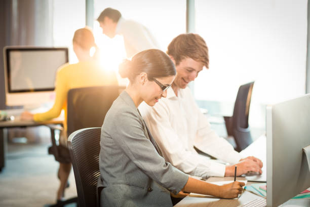 istock Businesswoman having a discussion with coworker 659711278