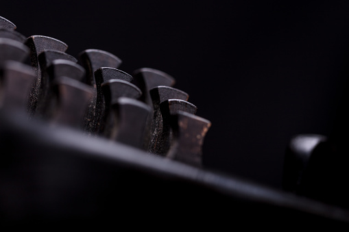 details of nyckelharpa's keys on black background