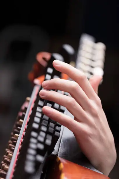 Photo of hands on a Baroque musical instrument