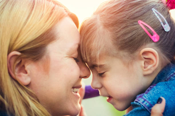 istock Serene mother and daughter headshot 659760046