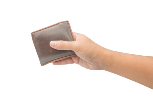 istock hand holding brown leather wallet isolated on white background 659764612