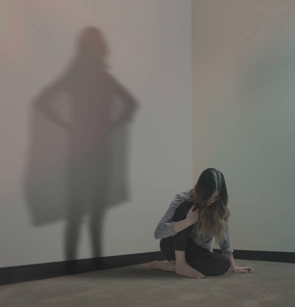 istock Woman shadow is confident and brave 659773226