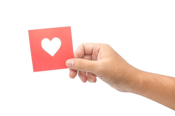 istock hand holding red paper heart isolated on white background 659801992
