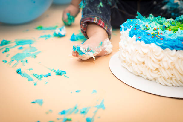 istock Baby foot in cake icing 659808142