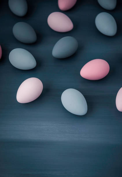 istock Hand painted gray, pink and blue ombre Easter eggs background 659809002