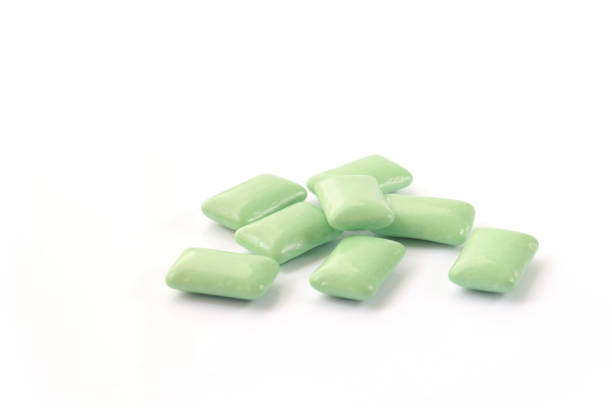istock green mint chewing gum tablet on white 659815628