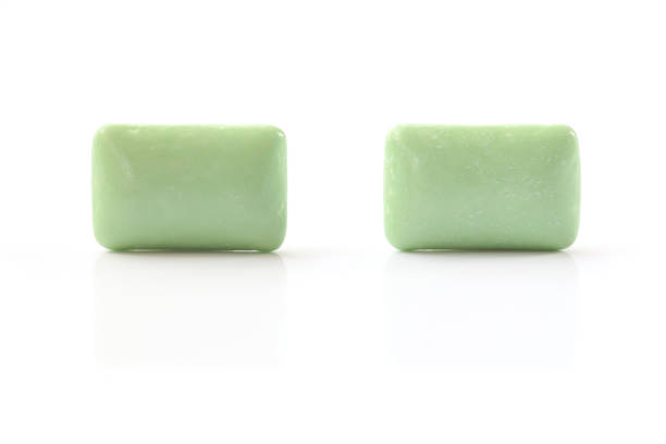 istock green mint chewing gum tablet on white 659815636