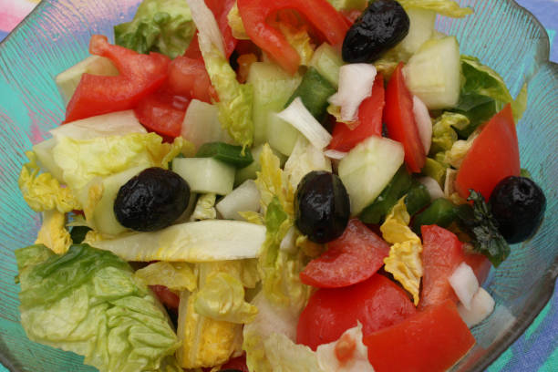 istock Compound salad :Green salad tomato cucumber black olive 659817792