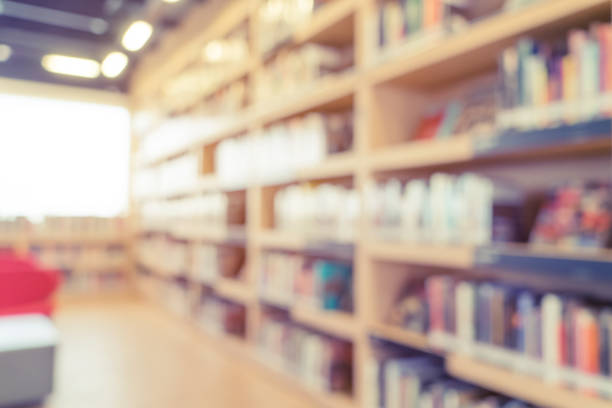 istock Perspective of blurred bookshelf 659893770