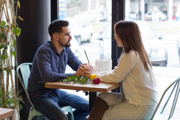 istock Young couple on date in cafe 659916680