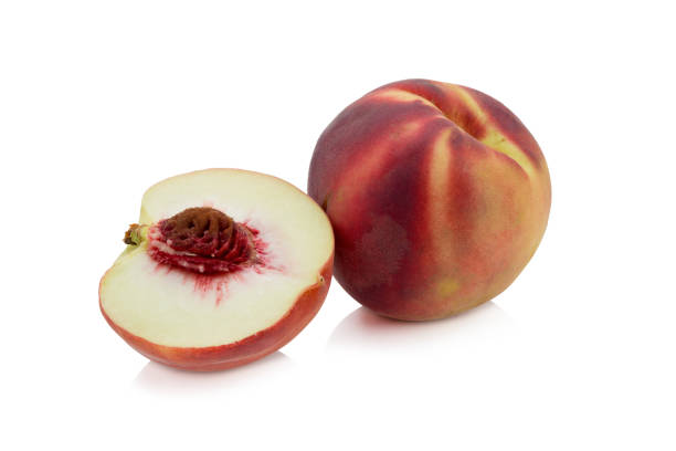 istock Peaches. Ripe fresh peaches with half and slice isolated on white background. 659939210