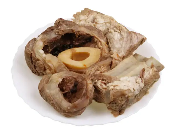 Boiled meat of beef ribs and leg with a bonel - a basis of dietary food for hemoglobin restoration. Isolated