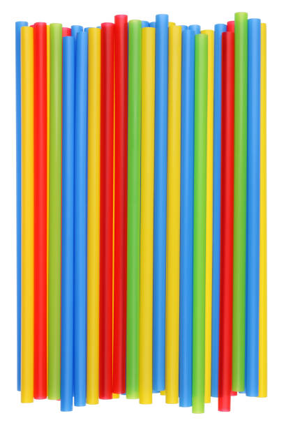 istock Heap of plastic multi-colored straws for cocktail with a diameter of eight millimeters. Isolated studio shot 659940640
