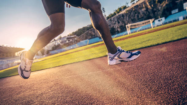 istock Close-up of athlete's legs in mid air during a run 659965012